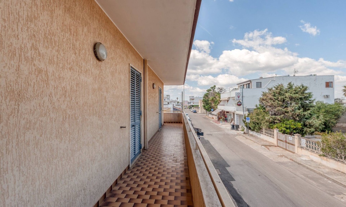 Torre Lapillo Apartment | Apartment 'Lucia' with Sea View, Private Terrace and Air Conditioning
