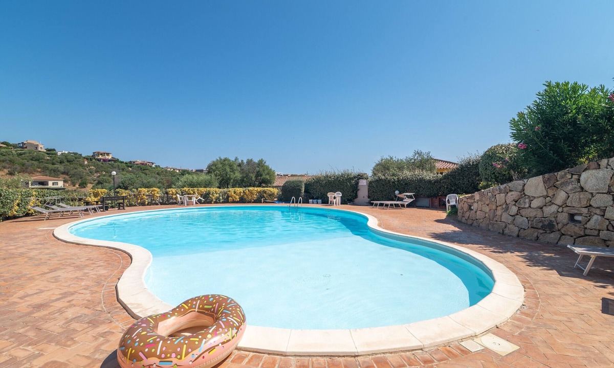 Porto San Paolo Apartment | Apartment 'Tavolara Porto San Paolo B3' with Sea View, Shared Pool and Air Conditioning
