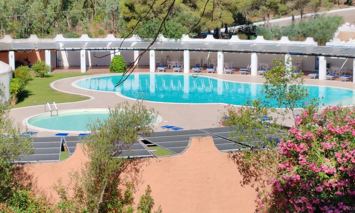 Eden Rock House | Cottage in holiday resort with a pool, detached annex, and large outdoor spaces.