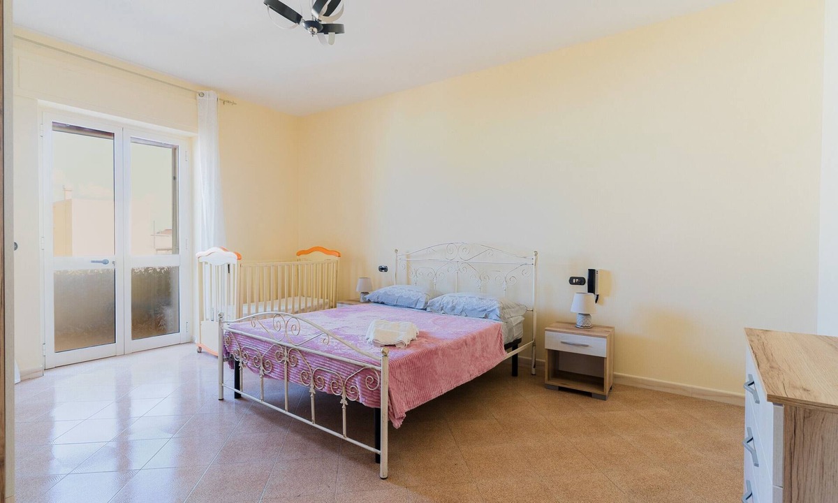 Taurisano House | Holiday Home 'Antonella' with Balcony and Air Conditioning