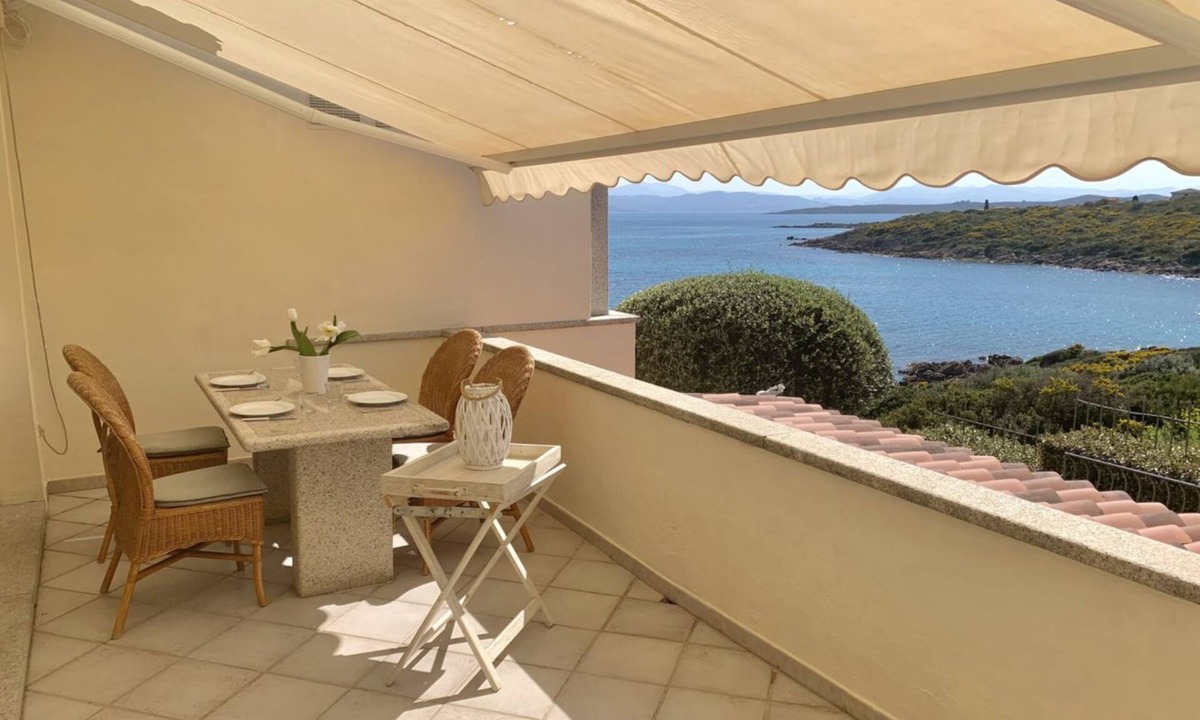 Baia Caddinas Apartment | Located in the side area of the residence, Elicriso is a one-bedroom apartment of approximately 55 sqm on the first floor, featuring a stunning sea view and a spacious panoramic terrace of 14 sqm. The terrace is furnished with a grani
