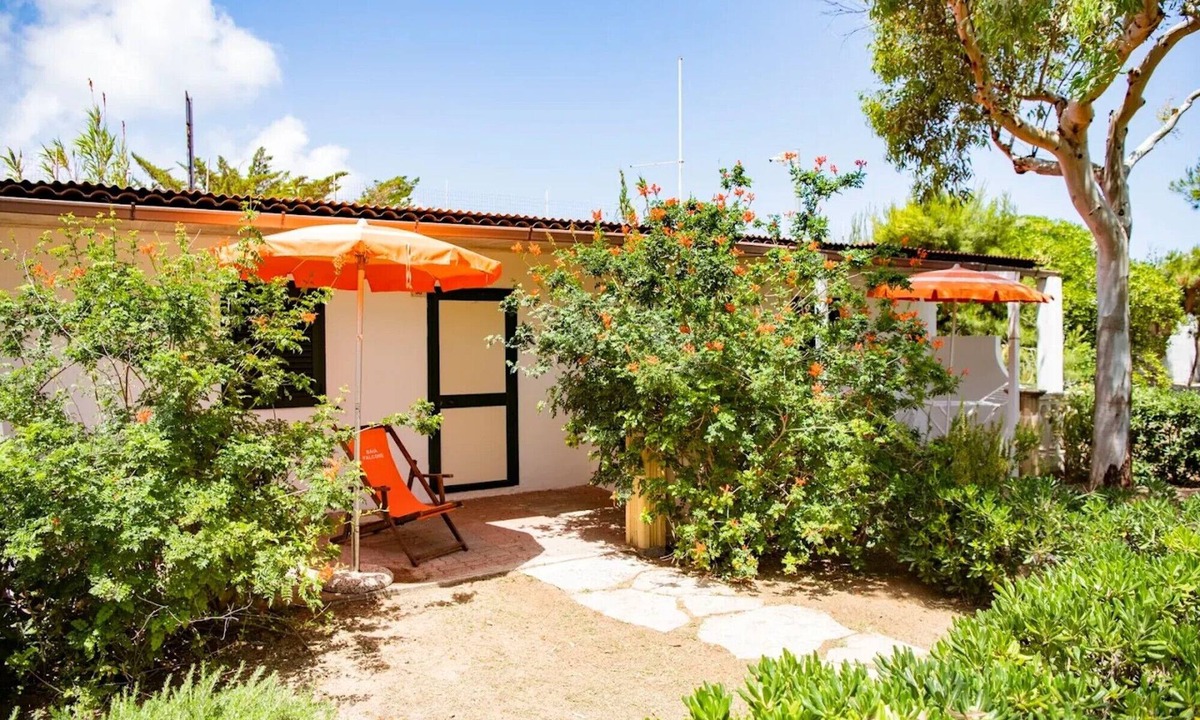 Chiesiola Resort | Property in a holiday village 'Baia Falcone-Bilocale 403' with sea view and air conditioning