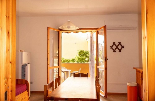 Lido Apartment | A comfortable 65 square meters apartment, perfect for six people, located on the first floor of a building without an elevator within a residential complex.The property is located in Alghero and enjoys an excellent location, close to the sea and several