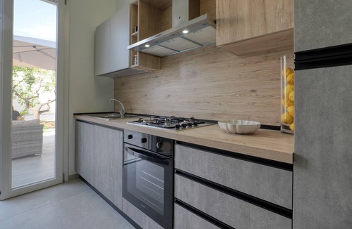 Cavallino House | Agrù - Salento Garden Stay - Lumìa Apartment with Shared Terrace, Wi-Fi & Air Conditioning