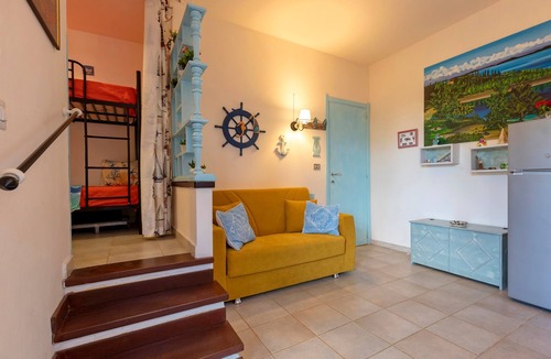 Stintino Apartment | Apartment Casa Erica with Garden, Terrace and Wi-Fi