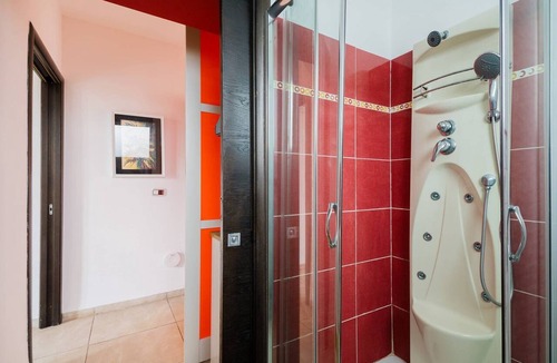Tuglie House | Apartment 'Core Resort - Familiare Rossa' with Pool, Wi-Fi, and Air Conditioning