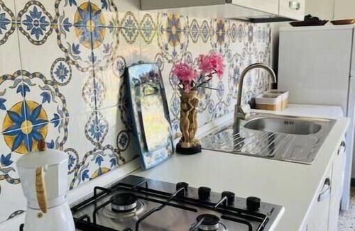 Porto Alabe Apartment | Apartment in a villa under a large palm tree and garden
