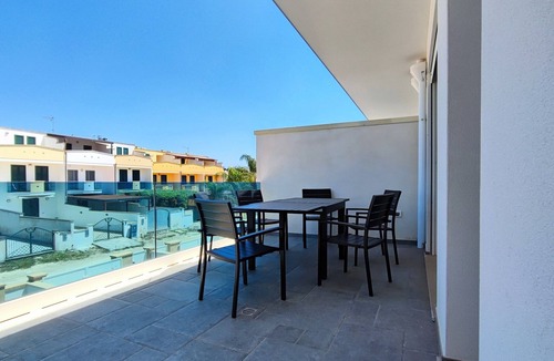 Torre San Giovanni Apartment | Apartment 'Nuovo T San Giovanni' with Private Terrace, Balcony and Air Conditioning