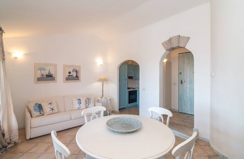 Porto San Paolo Apartment | Apartment 'Tavolara Porto San Paolo B3' with Sea View, Shared Pool and Air Conditioning
