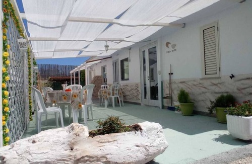 Peschici Apartment | Apartment 'Trilo 2' with Private Terrace, Shared Garden and Wi-Fi