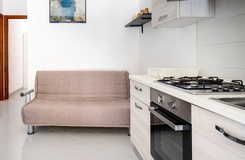 Torre Specchia Ruggeri House | Apartment 'Villa Ruggieri - Terra' with Private Terrace, Garden and Air Conditioning