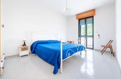 Torre Specchia Ruggeri House | Apartment 'Villa Ruggieri - Terra' with Private Terrace, Garden and Air Conditioning