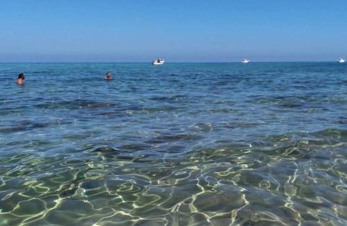Lu Bagnu Apartment | Attico trilocale vista mare strepitosa, 200 mt dal mare, WiFi Powerful