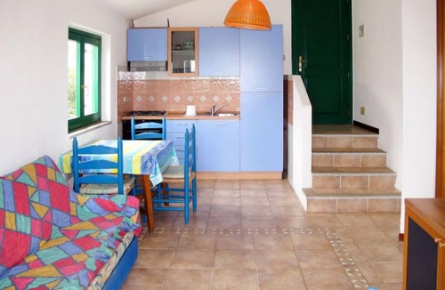 Tanaunella Apartment | Borgo Le Logge bilo (BUD110) by Interhome