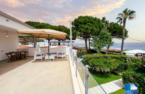 Calalunga-Pietragrande House | CALALUNGA PIETRAGRANDE - Exclusive Shoreline Haven