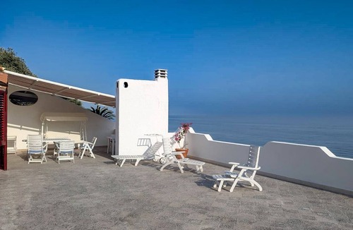 Vico del Gargano House | Casa Merla, terrace with a view of the sea