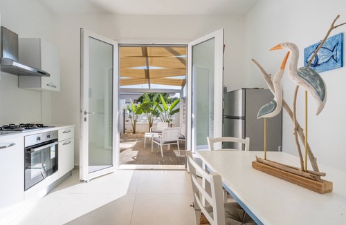 Porto Cesareo House | Casa Vacanze 'Lèvè – Sea Nature Stay' with Private Garden, Wi-Fi, and Air Conditioning