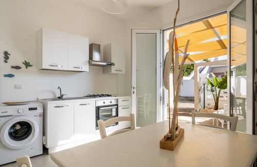 Porto Cesareo House | Casa Vacanze 'Lèvè – Sea Nature Stay' with Private Garden, Wi-Fi, and Air Conditioning