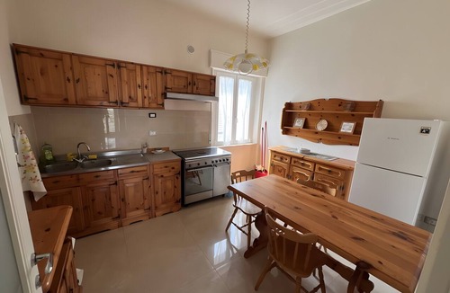La California Apartment | ‘Casa Vacanze Rita La California’ Apartment with Private Garden and Balcony