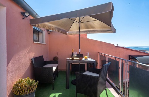 Nulvi Apartment | Charming Penthouse in Historic Village near the Sea