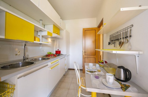 Colombare Apartment | Cinzia Apartment Front Beach- Pool, Garage & Terrace, Sirmione, Italy