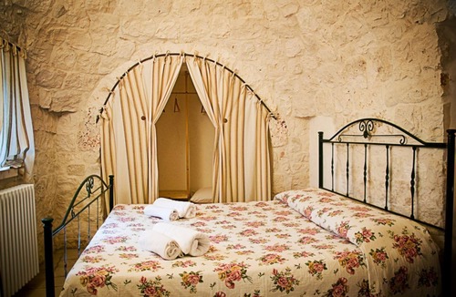 Martina Franca Villa | Degli Archi: 1800s trullo house with hillside views and pool