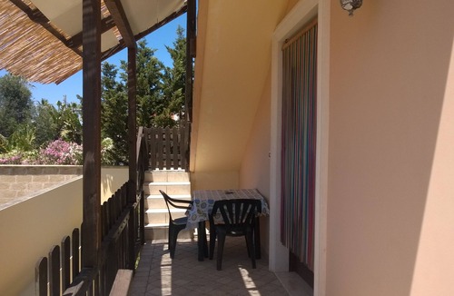 Torre Suda House | Fabulous one bedroom apartment just steps from the crystal clear sea in a residential area
