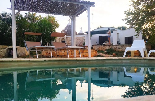 Ceglie Messapica Villa | Fantastic entire trullo with pool nestled in the peace of the olive trees, reserved