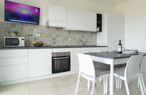 Pachino Apartment | GuestHost - Charming 75 sqm seaview apartment on two levels, for 5 people, located inside the renowned Borgo 84 residence, equipped with swimming pool and cycle path. The property is located just 3 km from the center of Marzamemi, one of the most fascina