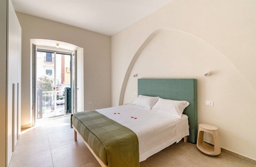 Trani Apartment | GuestHost - Stylish and comfortable of approximately 55 sqm apartment, accommodating up to 4 people, on the first floor of a four-story building with NO elevator (access via stairs).The property is located a stone's throw from Trani's city center and the