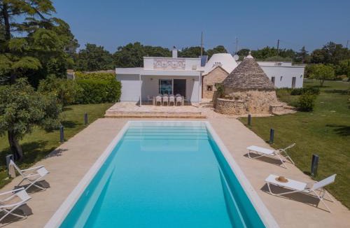 Gioia del Colle Villa | HelloAPULIA - Design Trulli Sampaolo with private pool - heated on request - Pet Friendly