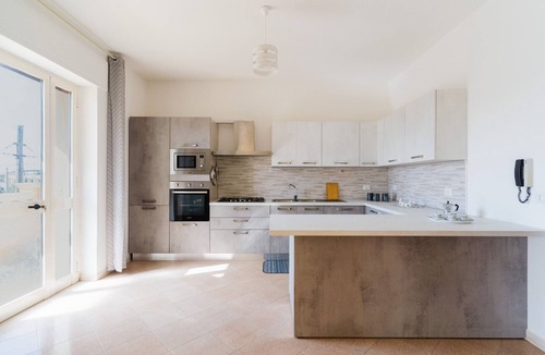 Taurisano House | Holiday Home 'Antonella' with Balcony and Air Conditioning