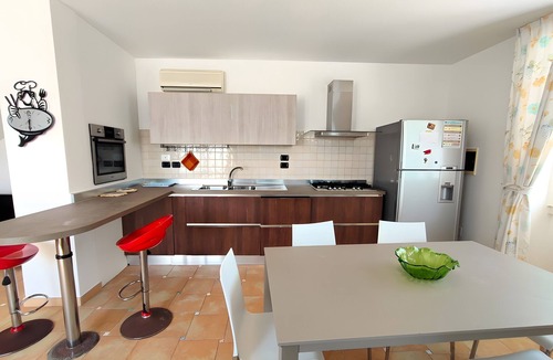 Torre San Giovanni House | Holiday Home 'Villetta A 200 Mt Dalle Spiagge' with Private Garden and Air Conditioning