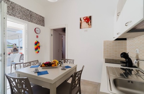 Porto Cesareo House | Holiday Home 'Luna Rossa Salento - Casa Rossa' with Sea View, Jacuzzi & Wi-Fi