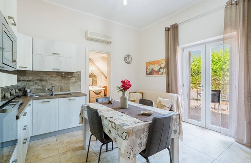 Torre Lapillo House | Holiday Home 'Marcella' with Private Terrace, Private Garden and Air Conditioning