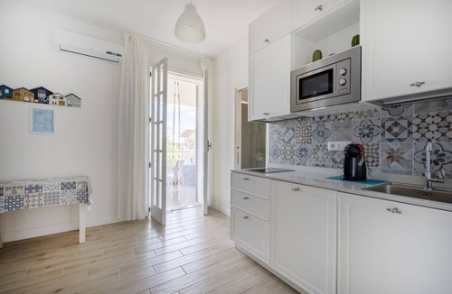 Monti D'arena-Bosco Caggione Apartment | Large studio apartment perfect for two people, is located in a shared villa but has its own private access. It features a shared garden and a large furnished patio for exclusive use. The accommodation is located in Marina di Pulsano, a well-served seasid