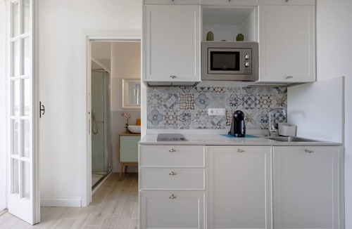 Monti D'arena-Bosco Caggione Apartment | Large studio apartment perfect for two people, is located in a shared villa but has its own private access. It features a shared garden and a large furnished patio for exclusive use. The accommodation is located in Marina di Pulsano, a well-served seasid