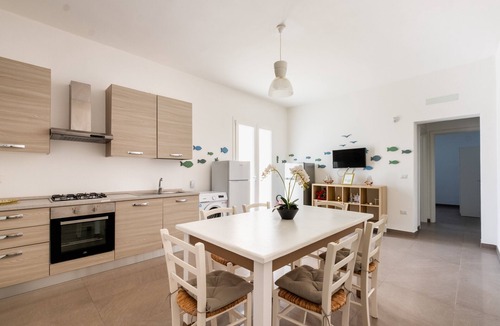 Torre Lapillo House | MIRÈA - Luxurious Coastal Villa with Shared Garden, Wi-Fi and Air Conditioning