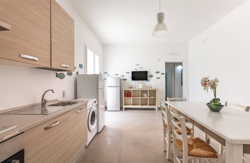 Torre Lapillo House | MIRÈA - Luxurious Coastal Villa with Shared Garden, Wi-Fi and Air Conditioning