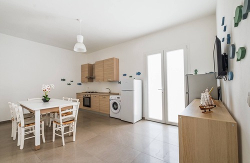 Torre Lapillo House | MIRÈA - Luxurious Coastal Villa with Shared Garden, Wi-Fi and Air Conditioning
