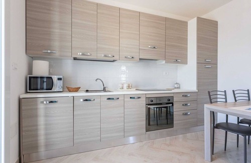 Marina di Pescoluse House | Nice apartment in villa for 4 guests with A/C, TV, patio and pets allowed