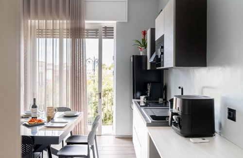 Melendugno Apartment | Piazza Pertini - Room Rubino with Balcony, Wi-Fi and Air Conditioning