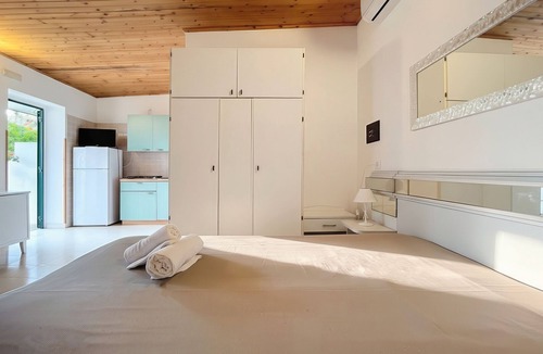 Chiesiola Resort | Property in a Holiday Village 'Baia Falcone - Comfort 210' with Sea View and Air Conditioning