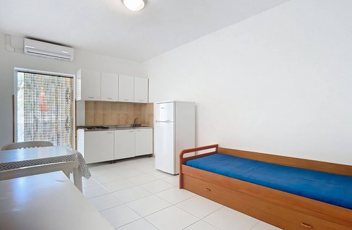 Chiesiola Resort | Property in a holiday village 'Baia Falcone - Standard 305' with sea view and air conditioning