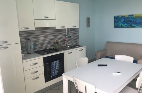 Lido Marini Apartment | Relaxation in Lido Marini: Terrace and air conditioning