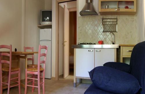 Santa Margherita di Pula Apartment | Residence with swimming pool near the sea