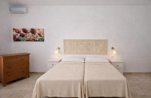 Santa Margherita di Pula Apartment | Residence with swimming pool near the sea