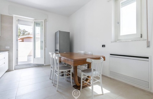 Torre Grande Apartment | Sandy Retreat