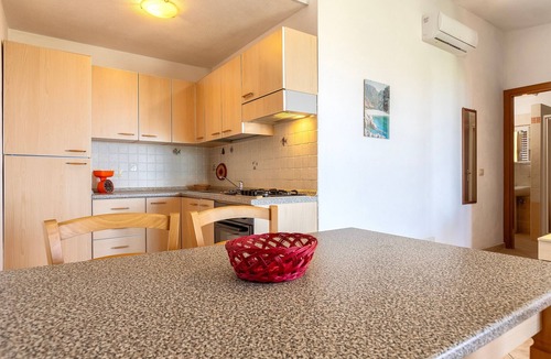 Paduledda House | Sea View Isola Rossa Apartment with Sea View, Wi-Fi, and Air Conditioning