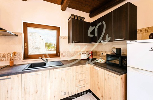 Coreggia House | TD Truly Trulli Gentle Breeze Across Olive Valley